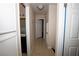 Hallway with neutral walls and light-colored tile leading to other rooms at 1340 Lucky St, Las Vegas, NV 89104