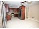 Modern kitchen featuring stainless steel appliances, granite countertops, and tile flooring at 1340 Lucky St, Las Vegas, NV 89104