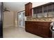 Updated kitchen with granite counters, mosaic backsplash, and stainless steel appliances at 1340 Lucky St, Las Vegas, NV 89104