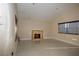 Bright living room with tile floors, recessed lighting, and a decorative fireplace perfect for relaxing or entertaining guests at 1340 Lucky St, Las Vegas, NV 89104