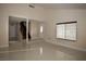 The living room features tile flooring, staircase access, and natural light, creating a welcoming and functional space at 1340 Lucky St, Las Vegas, NV 89104