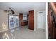 Open-concept living room with access to kitchen and outdoor patio at 1340 Lucky St, Las Vegas, NV 89104
