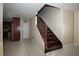 Staircase located near kitchen and living area, near an exterior door at 1340 Lucky St, Las Vegas, NV 89104