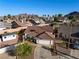 Charming single-story home with a tile roof, well-manicured front yard, and a two-car garage at 159 Coastal Pier Ct, Henderson, NV 89002