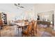 Bright open-concept living and dining area, with stylish decor, and a connected office space at 159 Coastal Pier Ct, Henderson, NV 89002