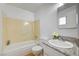 Bathroom featuring a bathtub, shower, granite countertop and modern sink at 1608 June Ave, North Las Vegas, NV 89032