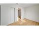 Bedroom featuring wood-look floors, a closet and neutral paint at 1608 June Ave, North Las Vegas, NV 89032