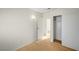 Bedroom features wood-look floors, a light fixture and a closet at 1608 June Ave, North Las Vegas, NV 89032