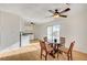 Dining area with laminate flooring and views into the adjacent kitchen at 1608 June Ave, North Las Vegas, NV 89032