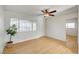 Open living area with natural light, wood look flooring, and large window at 1608 June Ave, North Las Vegas, NV 89032