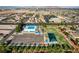Aerial shot showcasing the community pool, park, and recreational area with ample parking at 1608 June Ave, North Las Vegas, NV 89032