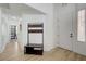 Spacious home entryway with coat rack and hardwood floors at 201 Crown Imperial St, Henderson, NV 89074