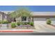 Charming single story home with a two car garage and desert landscaping at 201 Crown Imperial St, Henderson, NV 89074