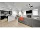 Open concept living space features kitchen, dining area, hardwood floors and living room at 201 Crown Imperial St, Henderson, NV 89074