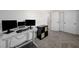 Well lit living room showing computer desk, chair, and closet at 201 Crown Imperial St, Henderson, NV 89074
