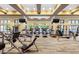 Well-equipped fitness center with treadmills, weight machines, and ample natural light at 21 Grand Masters Dr, Las Vegas, NV 89141