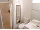 Bathroom with a tiled countertop, toilet, mirror, bathtub, and shower with a curtain at 2471 Old Forge Ln # 105, Las Vegas, NV 89121