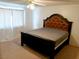 Spacious main bedroom with a ceiling fan and carpeted floors at 2471 Old Forge Ln # 105, Las Vegas, NV 89121