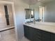 Bathroom featuring a vessel sink on a sleek vanity and a tiled shower/tub combo at 248 Crystal Rose Ct, Las Vegas, NV 89106