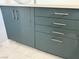Close up of the vanity with a grey finish and sleek, horizontal chrome hardware at 248 Crystal Rose Ct, Las Vegas, NV 89106