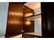 Interior of a cabinet featuring dark wood finish, adjustable shelves, and ample storage space at 248 Crystal Rose Ct, Las Vegas, NV 89106