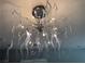 Unique, contemporary chandelier fixture with artistic glass design and stylish lighting at 248 Crystal Rose Ct, Las Vegas, NV 89106