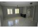 Open living room with abundant natural light, and a decorative light fixture at 248 Crystal Rose Ct, Las Vegas, NV 89106