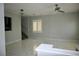 Spacious living room area with staircase, light-colored walls, marble floors, and ample natural light at 248 Crystal Rose Ct, Las Vegas, NV 89106
