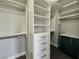 Spacious walk-in closet with custom shelving, drawers, and ample storage space for organization at 248 Crystal Rose Ct, Las Vegas, NV 89106