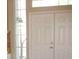 Inviting double front doors with sidelights, enhancing natural light in the entryway at 254 Horizon Pointe Cir, Henderson, NV 89012
