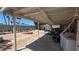 Expansive covered back patio with brick pavers, offering an inviting outdoor living and entertainment area at 2965 Palma Vista Cir, Las Vegas, NV 89169