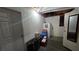 A look at a basement with a refrigerator and furnishings at 2965 Palma Vista Cir, Las Vegas, NV 89169