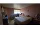 Standard bedroom with a bed, side tables, and a window with blinds at 2965 Palma Vista Cir, Las Vegas, NV 89169
