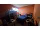 Simple bedroom including a bed, window, tv and furniture at 2965 Palma Vista Cir, Las Vegas, NV 89169