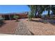 Single-story residence with solar panels, desert landscaping, and an inviting covered porch at 2965 Palma Vista Cir, Las Vegas, NV 89169