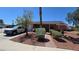Charming single-story residence with solar panels, desert landscaping, and an inviting covered porch at 2965 Palma Vista Cir, Las Vegas, NV 89169