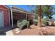 The front yard is xeriscaped with desert landscaping and features a covered front porch at 2965 Palma Vista Cir, Las Vegas, NV 89169
