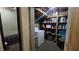 A look at a utility area with laundry equipment and shelving at 2965 Palma Vista Cir, Las Vegas, NV 89169