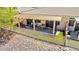 An elevated view of the backyard shows an enclosed patio with an outdoor dining set and mountain views at 3337 Partridge Run St, Laughlin, NV 89029