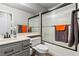 Bathroom featuring shower and tub combo with glass doors and gray vanity and countertop at 3337 Partridge Run St, Laughlin, NV 89029