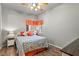 Cozy bedroom with a ceiling fan, stylish bedding, and natural light at 3337 Partridge Run St, Laughlin, NV 89029