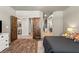 Comfortable bedroom featuring wooden doors that lead to other rooms of the home at 3337 Partridge Run St, Laughlin, NV 89029