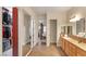 Spacious bathroom featuring walk-in closet and large vanity at 3540 Wisdom Ct, Las Vegas, NV 89120