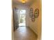 Welcoming foyer with tile flooring, custom gate, and decorative wall art at 3540 Wisdom Ct, Las Vegas, NV 89120