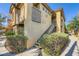 Charming condo exterior with well-maintained landscaping and inviting staircase, creating a welcoming atmosphere at 4400 S Jones Blvd # 2007, Las Vegas, NV 89103
