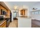 Kitchen with granite countertops and black appliances, open to living area at 4400 S Jones Blvd # 2007, Las Vegas, NV 89103