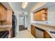 Kitchen featuring stainless steel appliances, granite countertops and wooden cabinets at 4400 S Jones Blvd # 2007, Las Vegas, NV 89103
