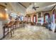 Grand living room featuring tile flooring, wet bar, and fireplace at 4400 S Jones Blvd # 2007, Las Vegas, NV 89103