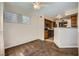 Cozy living room open to kitchen with ceiling fan and bright window at 4400 S Jones Blvd # 2007, Las Vegas, NV 89103