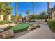 Community putting green for residents to enjoy located by apartment buildings at 4400 S Jones Blvd # 2007, Las Vegas, NV 89103